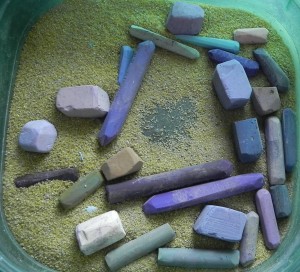 Pastels used for the rocks--a mix of grayed violets, greens, blues, and browns